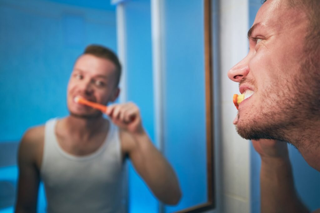 man brushing teeth home bathroom 1049937 312