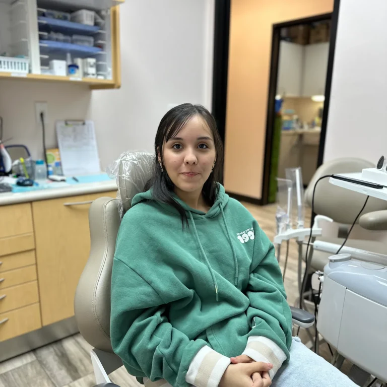 Latina teenage patient smiling after her dental visit at MiraMar Family Dental in Katy, Texas