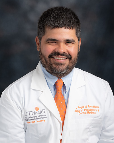Dr. Arce-Munoz, periodontist and implant specialist at MiraMar Family Dental in Katy, Texas